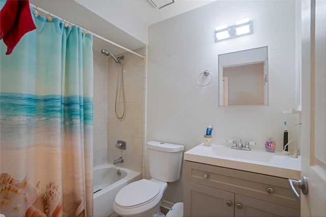 full bathroom with vanity, toilet, and shower / bath combo with shower curtain