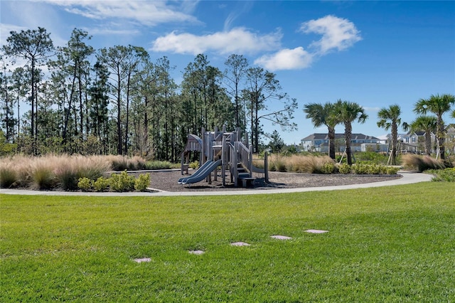 view of jungle gym with a lawn