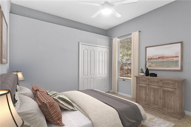 bedroom with a closet, carpet floors, and ceiling fan