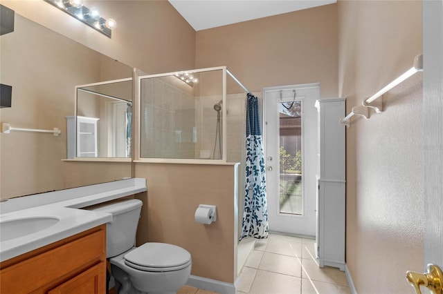 bathroom featuring tile patterned floors, vanity, toilet, and a shower with shower curtain