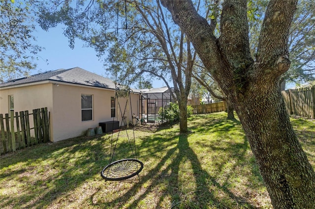 view of yard featuring a lanai