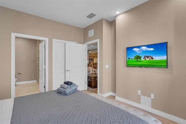 unfurnished bedroom featuring ensuite bath