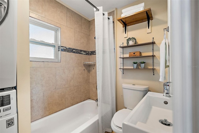 full bathroom with shower / bath combination with curtain, toilet, and sink