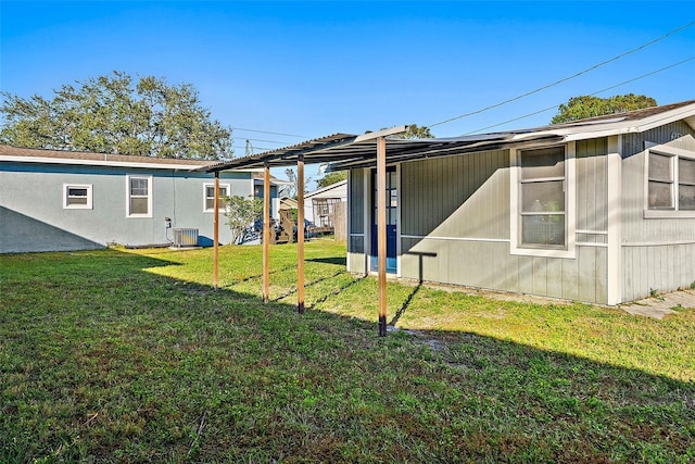 view of yard featuring central AC unit