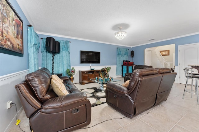 tiled living room featuring a textured ceiling and crown molding