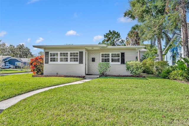 view of front of house with a front lawn