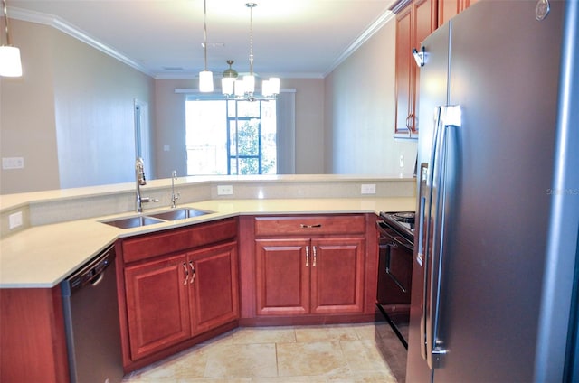 kitchen with sink, stainless steel appliances, a notable chandelier, pendant lighting, and ornamental molding