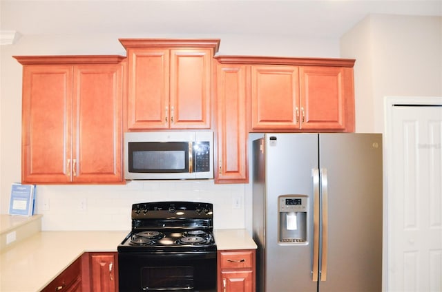 kitchen featuring decorative backsplash and stainless steel appliances