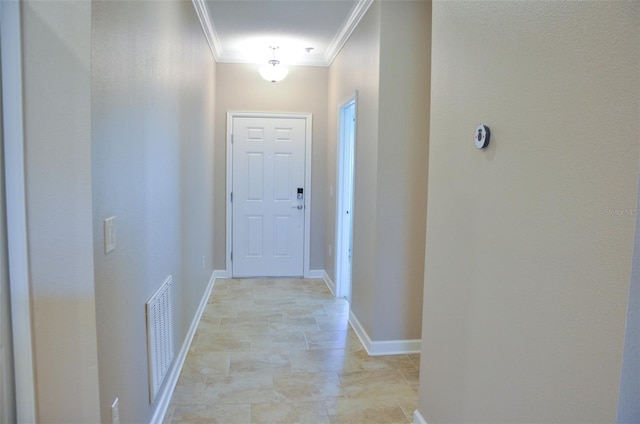 hallway featuring crown molding