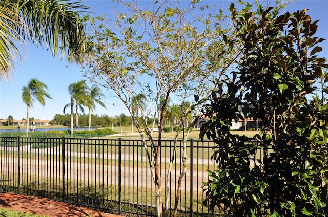 view of gate with a water view