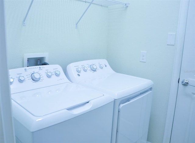 laundry area featuring washer and clothes dryer