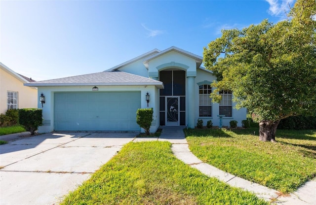 single story home with a front lawn and a garage