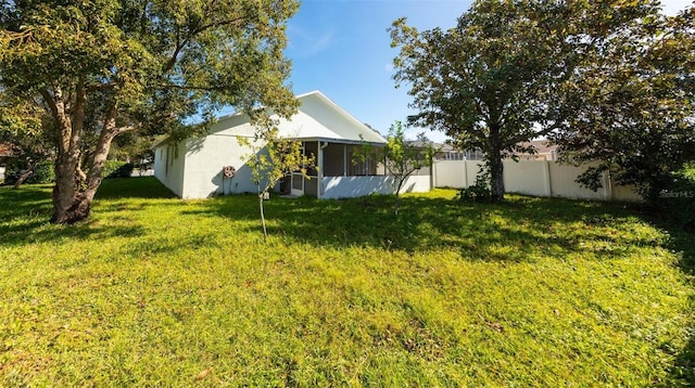 view of yard featuring a sunroom