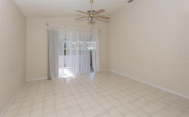 empty room featuring ceiling fan and lofted ceiling