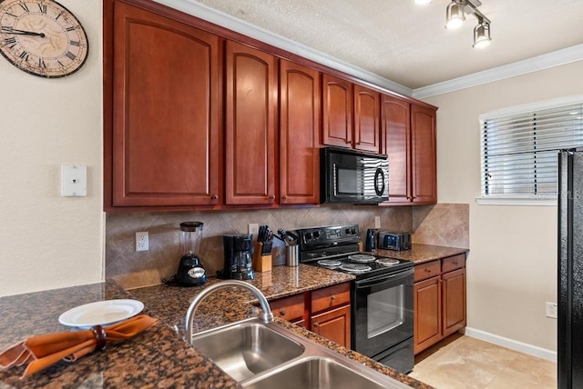 kitchen featuring dark stone countertops, tasteful backsplash, crown molding, and black appliances