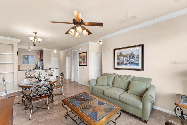 living room featuring light tile patterned floors, ceiling fan with notable chandelier, built in shelves, and ornamental molding