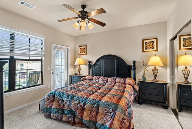 carpeted bedroom with ceiling fan