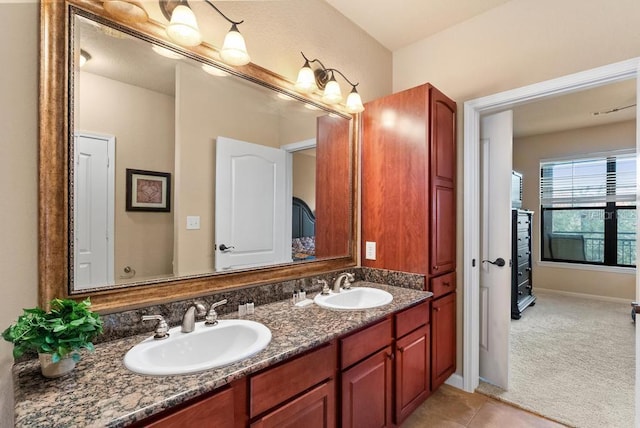 bathroom featuring tile patterned floors and vanity