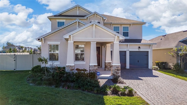 4381 Davos Dr, Clermont, FL 34711 - craftsman house featuring decorative driveway, a porch, stucco siding, stone siding, and an attached garage