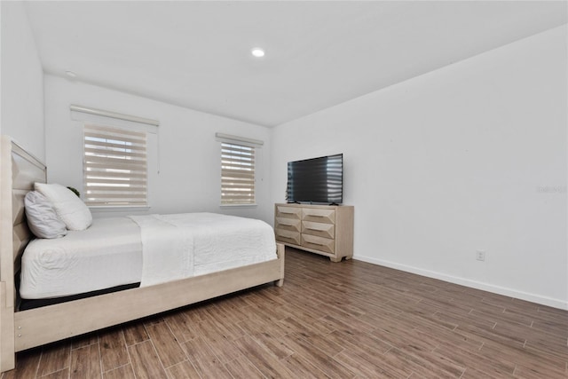 bedroom featuring wood-type flooring