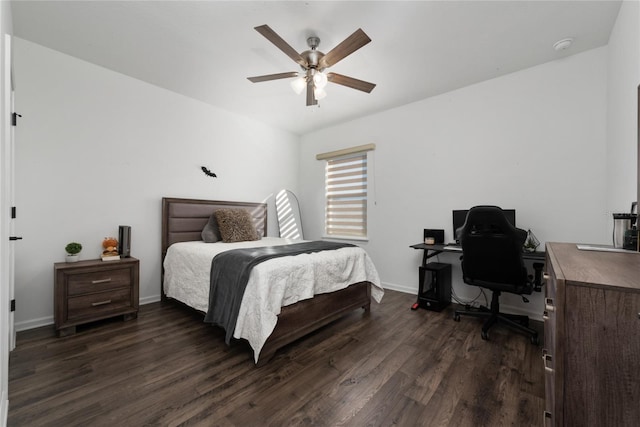 bedroom with ceiling fan and dark wood-type flooring