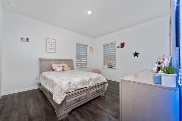 bedroom featuring dark hardwood / wood-style floors