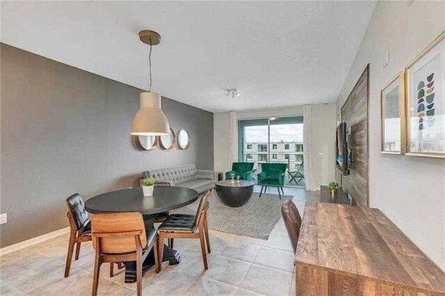 view of tiled dining area