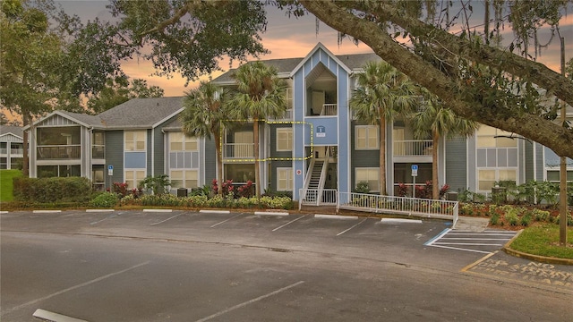 view of outdoor building at dusk