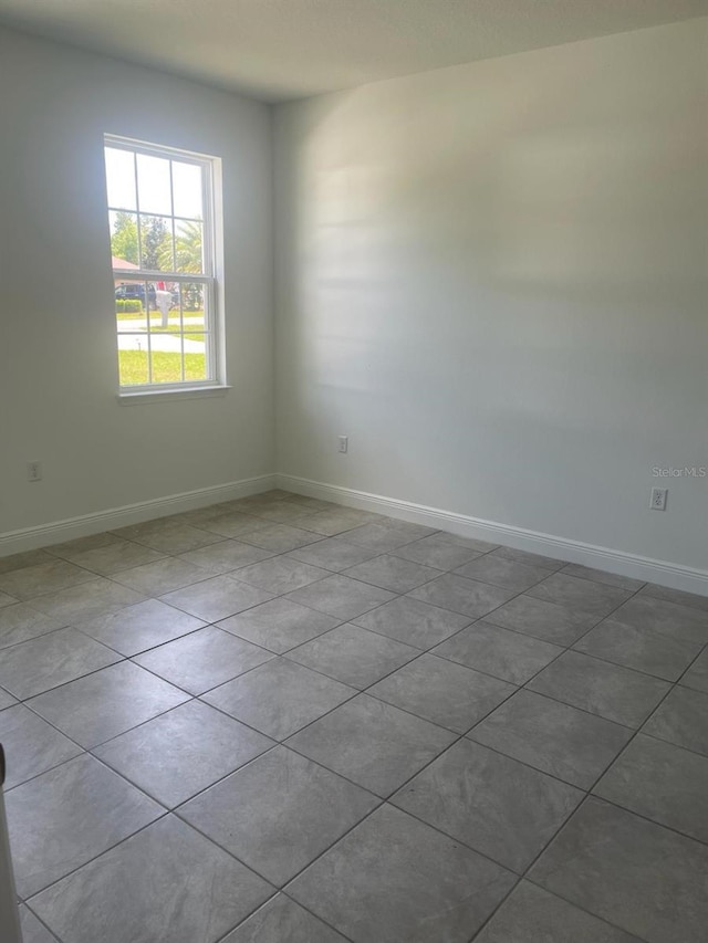 view of tiled spare room