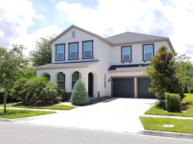 view of front of property with a garage