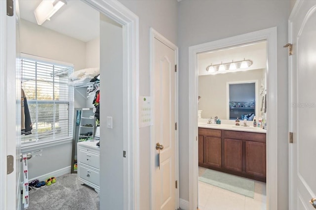 bathroom featuring tile patterned floors and vanity