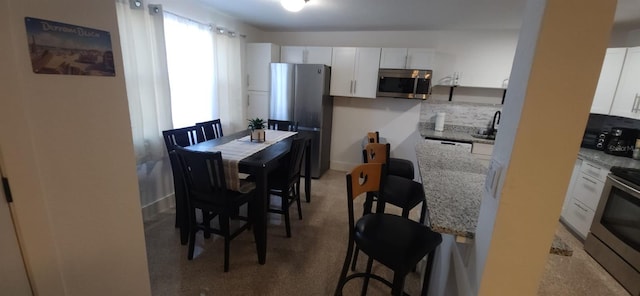 view of carpeted dining room