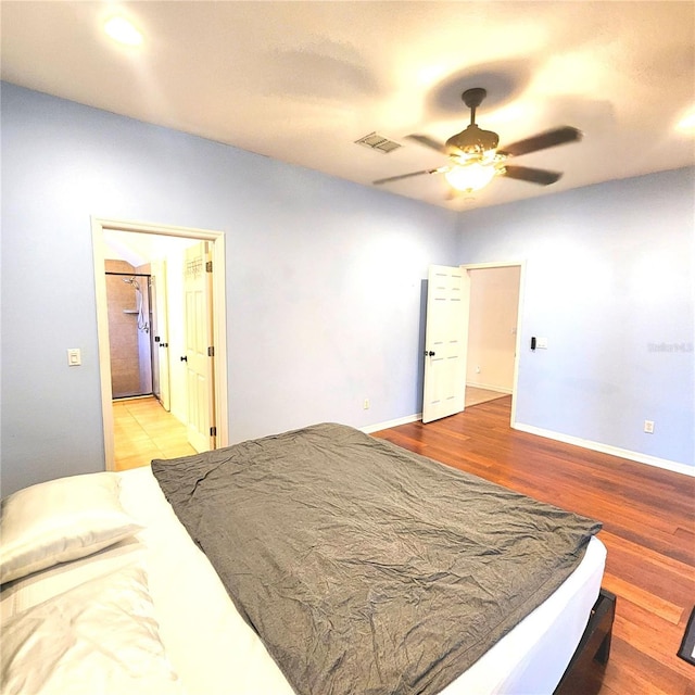 bedroom featuring ceiling fan and light wood-type flooring