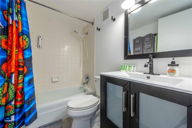 full bathroom featuring shower / bathtub combination with curtain, vanity, and toilet