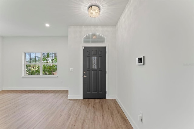 entrance foyer with light hardwood / wood-style flooring