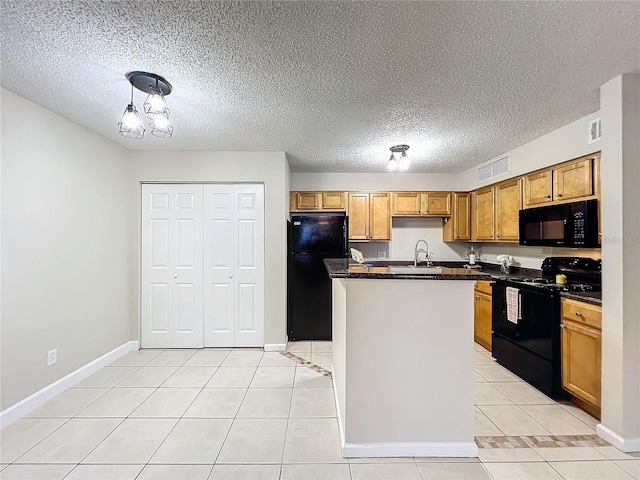 kitchen featuring sink, light tile patterned floors, black appliances, and a textured ceiling