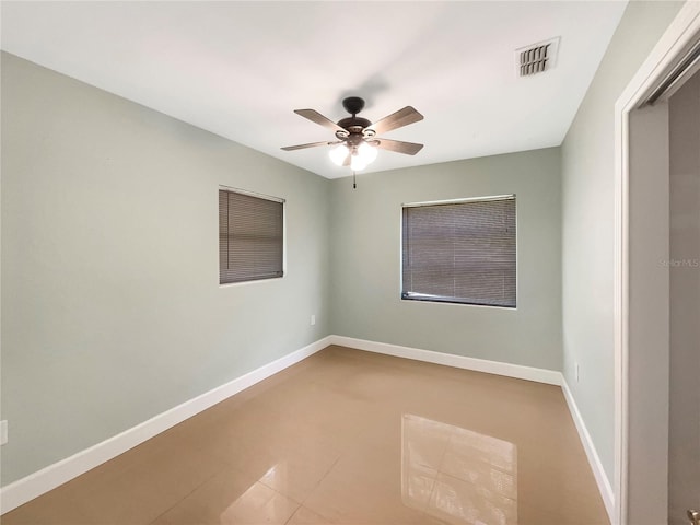 empty room featuring ceiling fan