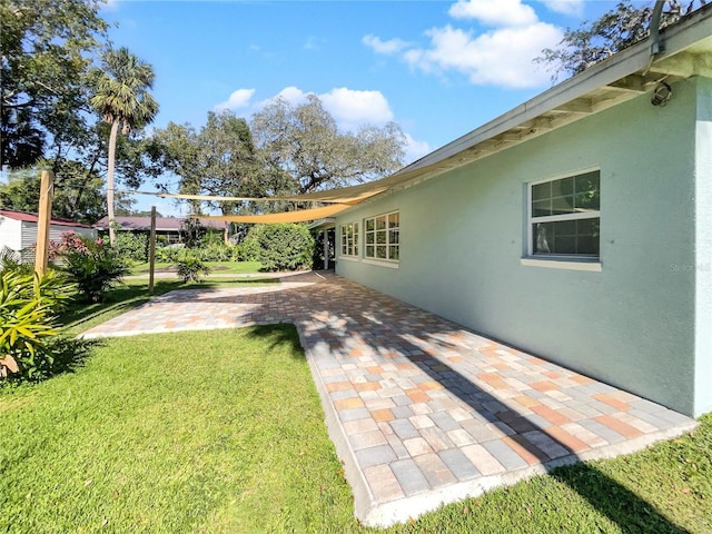 view of yard with a patio area