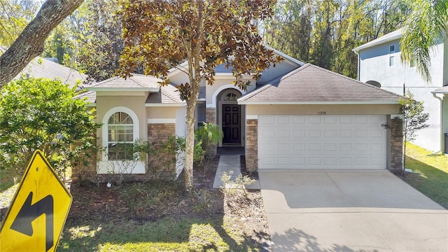 view of front of property with a garage