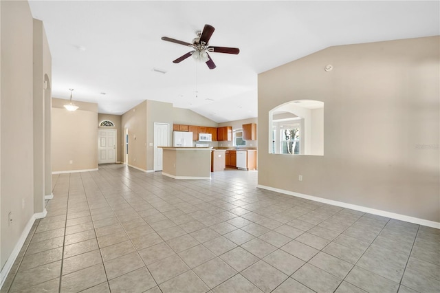 unfurnished living room featuring ceiling fan, light tile patterned flooring, and lofted ceiling