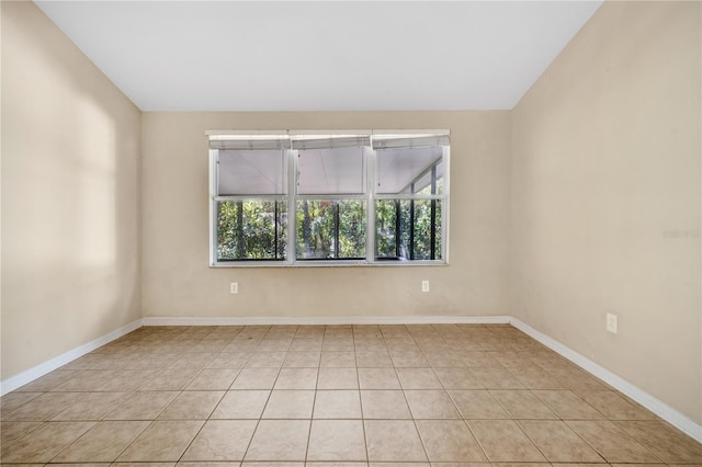 view of tiled spare room