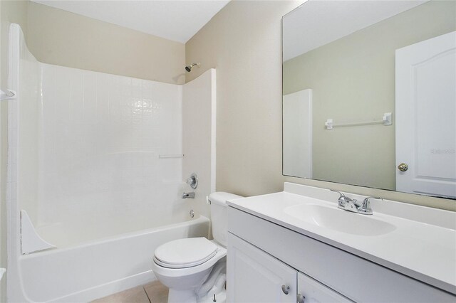 full bathroom with tile patterned floors, vanity, shower / bath combination, and toilet