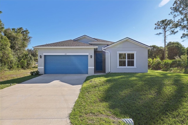 ranch-style house featuring a garage and a front lawn