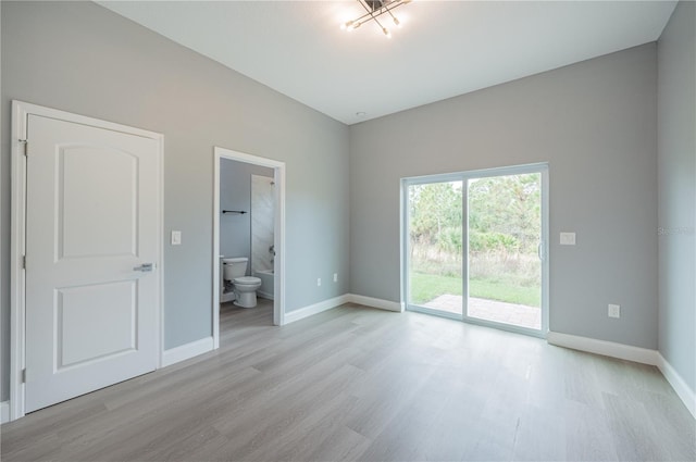 unfurnished room featuring light hardwood / wood-style floors