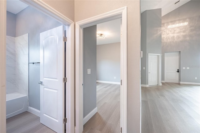 hallway featuring light hardwood / wood-style floors