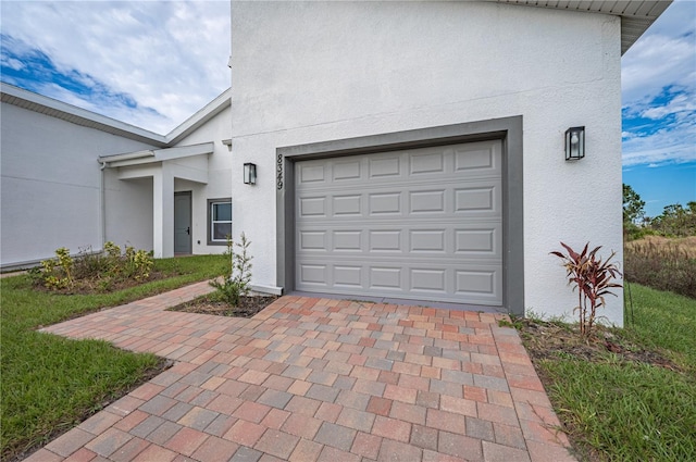 garage with a yard