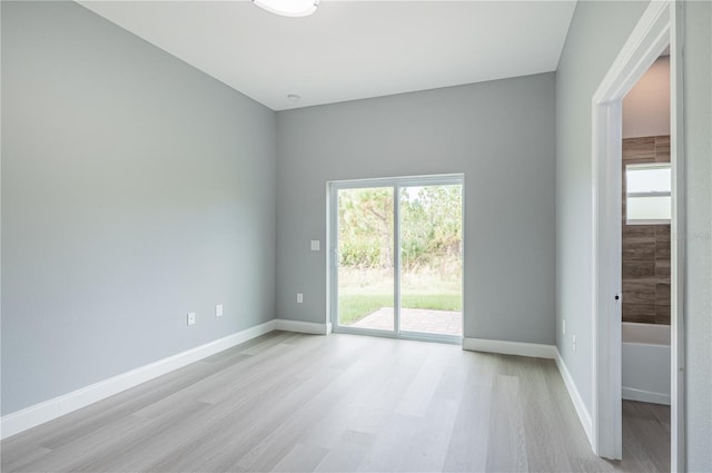 empty room with light wood-type flooring