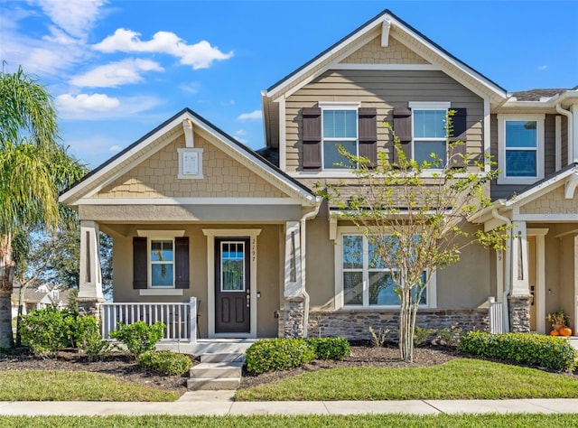 craftsman-style home featuring covered porch