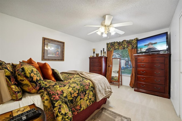 5417 Lake Margaret Dr Unit G, Orlando, FL 32812 - bedroom with light colored carpet, a textured ceiling, and ceiling fan
