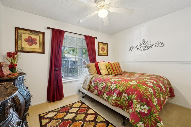 5417 Lake Margaret Dr Unit G, Orlando, FL 32812 - carpeted bedroom with ceiling fan and a textured ceiling